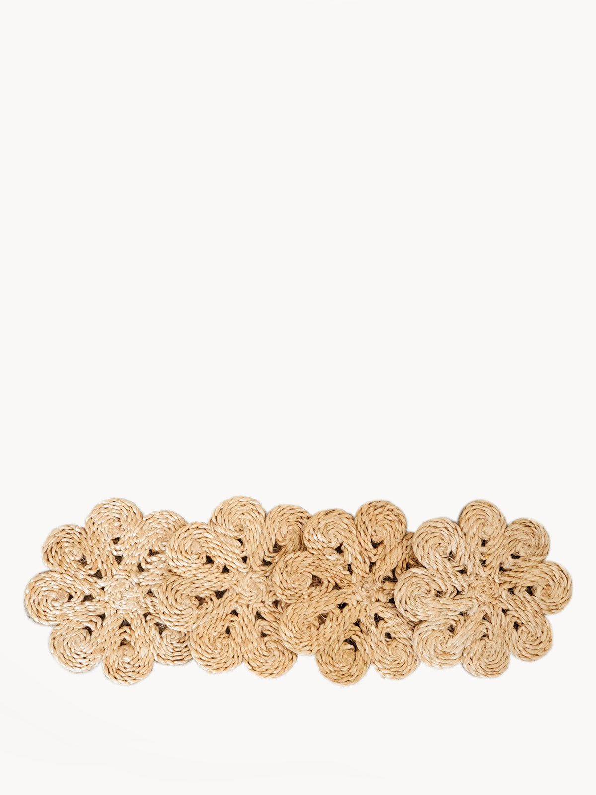 Approximately 4” round. sustainably handmade. braided jute. drink coasters. flower shaped drink coaster. 