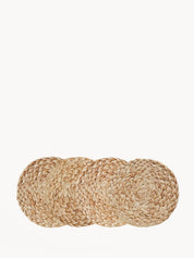  Approximately 4” round. sustainably handmade. braided jute. drink coasters. 
