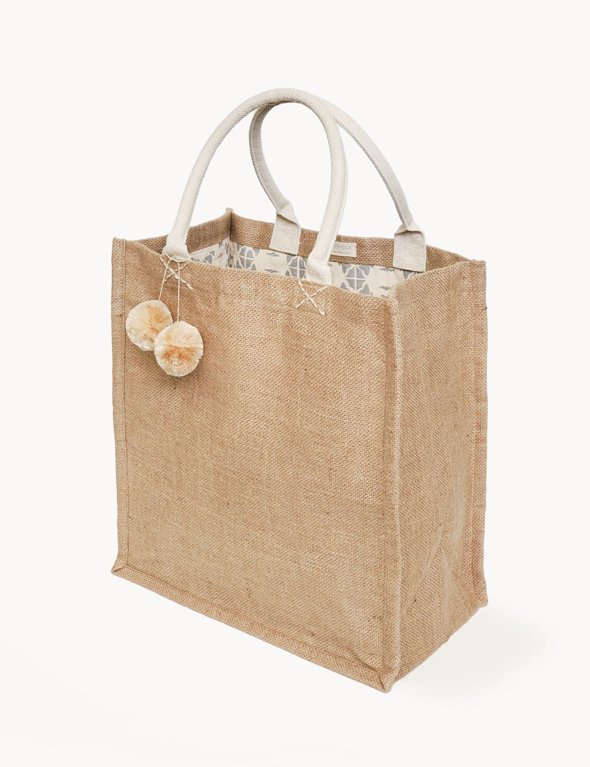 16” tall x 15” wide x 9" deep.  jute pompom detail. Handmade reusable Jute Market Bag. Lined. 