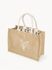 Handmade Jute Market Bag. Reusable. Leaf Patter Print. Approximately 11” tall x 15.5” wide x 7.5" deep. Canvas lining with cotton. Colors Natural, White, Green. 