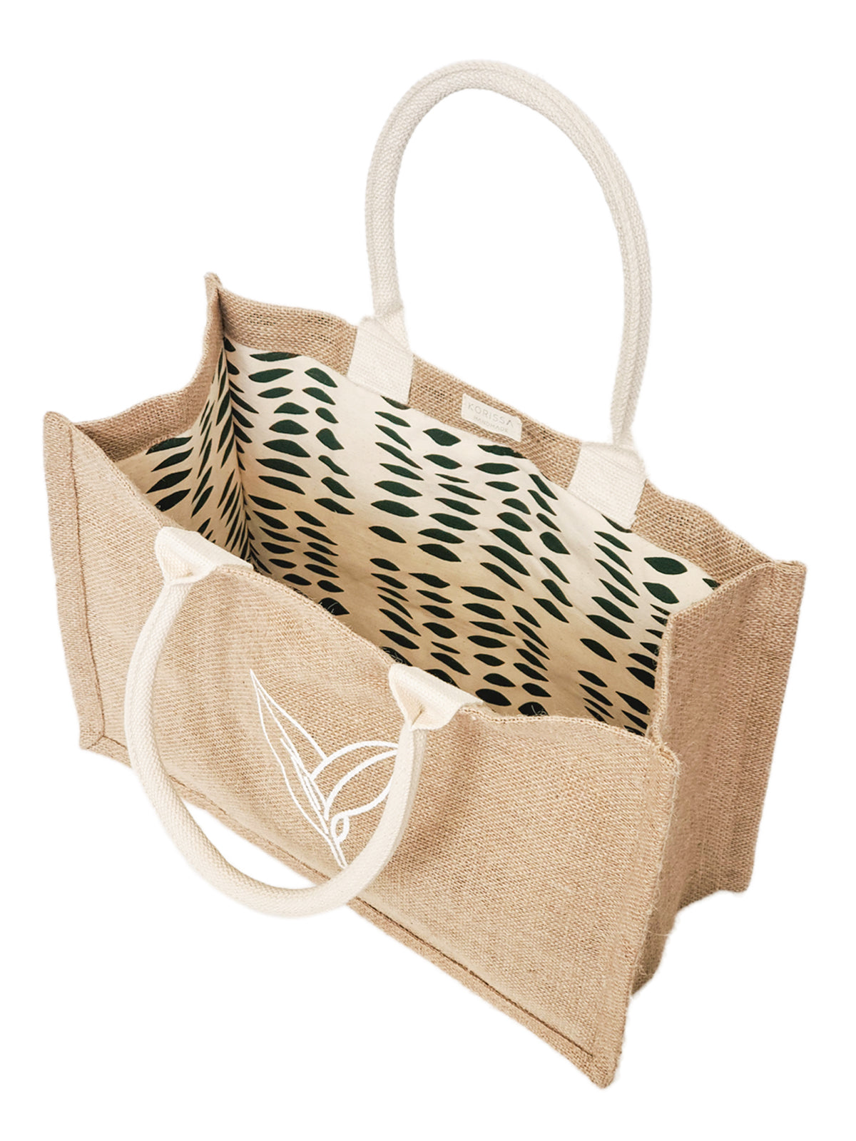 Handmade Jute Market Bag. Reusable. Leaf Patter Print. Approximately 11” tall x 15.5” wide x 7.5" deep. Canvas lining with cotton. Colors Natural, White, Green. 