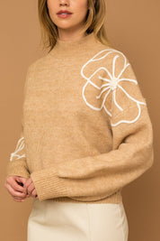 Flower Embroidery Mock Neck Sweater. taupe knit sweater with large white embroidered flowers.