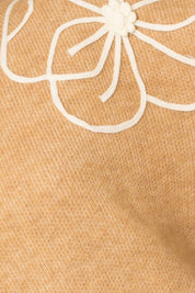 Flower Embroidery Mock Neck Sweater. taupe knit sweater with large white embroidered flowers.