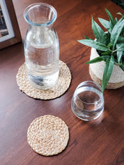  Approximately 4” round. sustainably handmade. braided jute. drink coasters. 