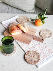  Approximately 4” round. sustainably handmade. braided jute. drink coasters. 