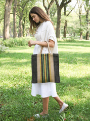 16”tall x 16"wide / Handle drop 7". 100% Handwoven Jute Fabric. Natural, Navy and Multicolor in color.