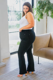 Harriet High Rise Button Fly Bootcut Jeans in Black - Sunday Golden