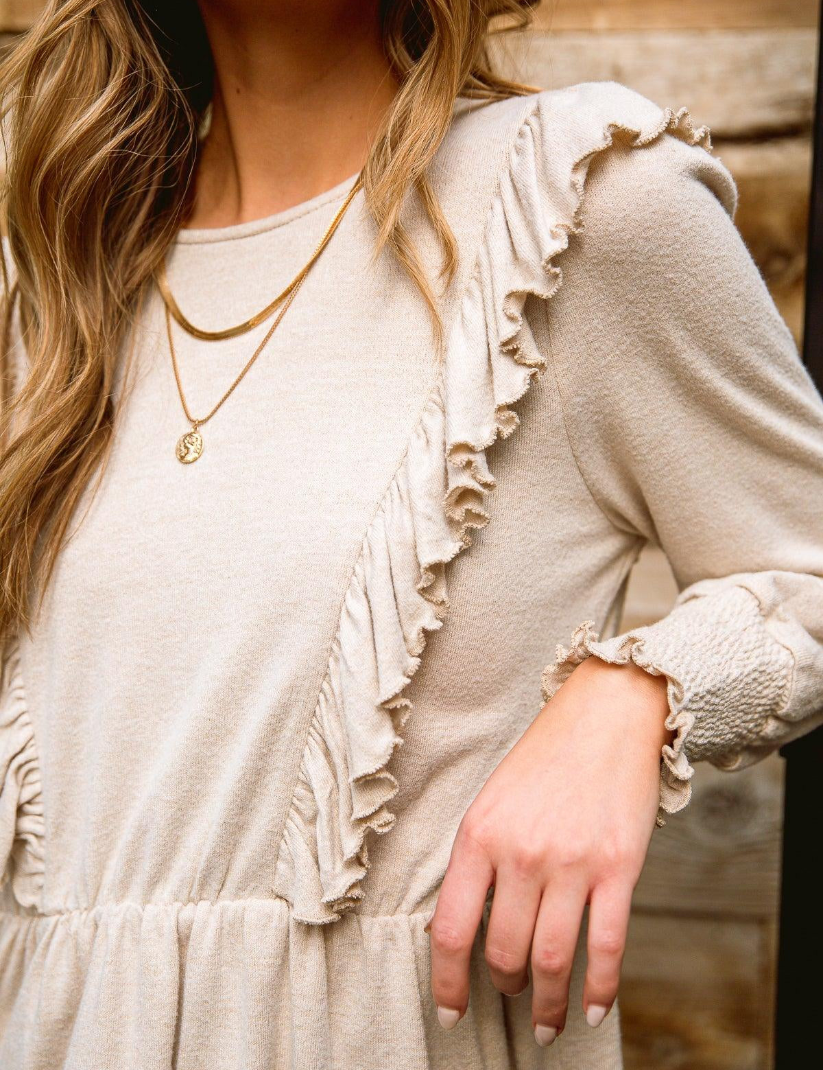Sweet Confession Top In Seashell. long sleeve ruffle front blouse. Lightweight blouse.